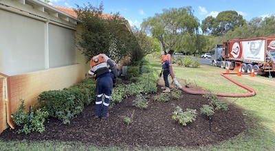 Commercial Property Maintenance at Aged Care Disability Care and Healthcare Facilities using Mulch Blower Trucks by PMB Perth Materials Blowing