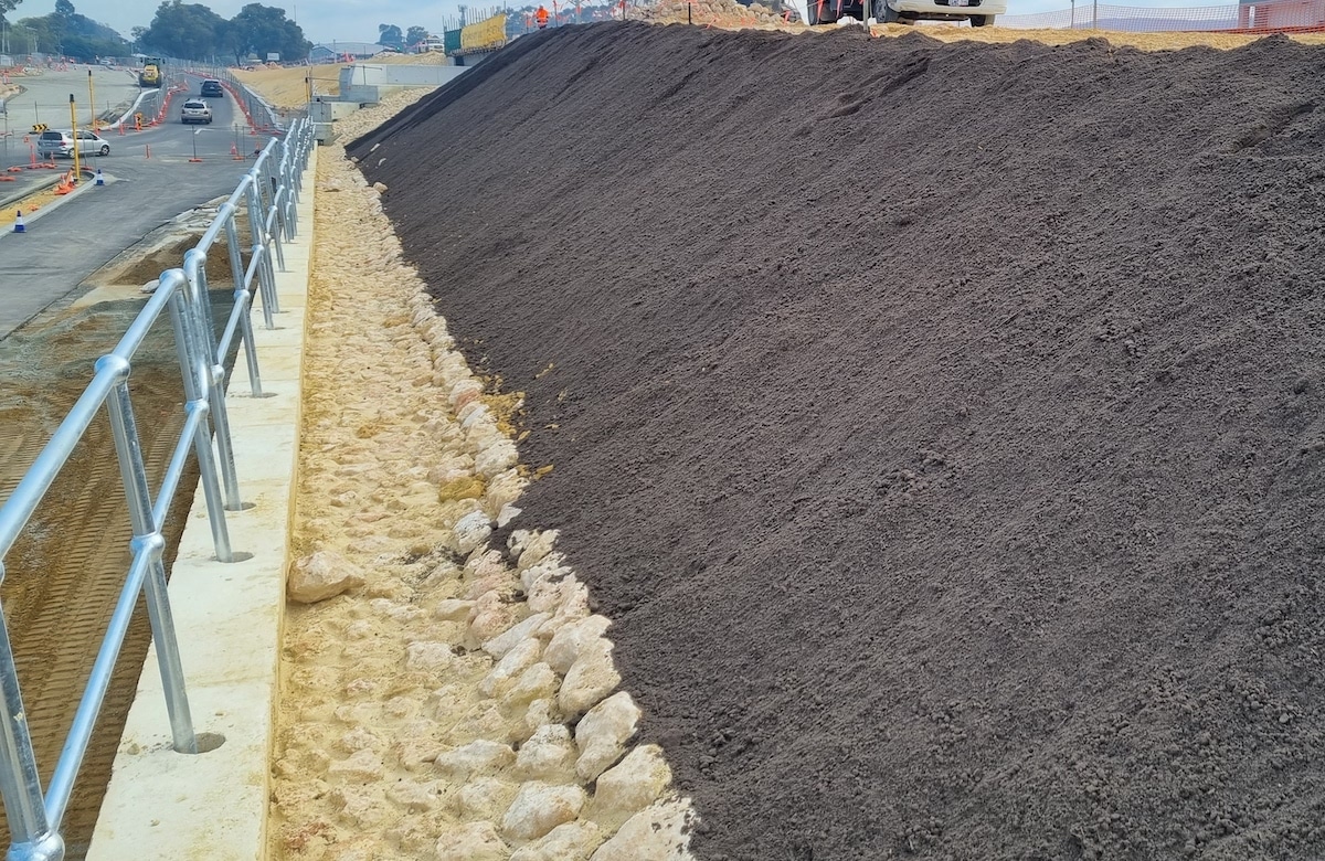 Batter Slope • Road Batter • Soil placement using PMB Slinger in Western Australia • Perth Materials Blowing